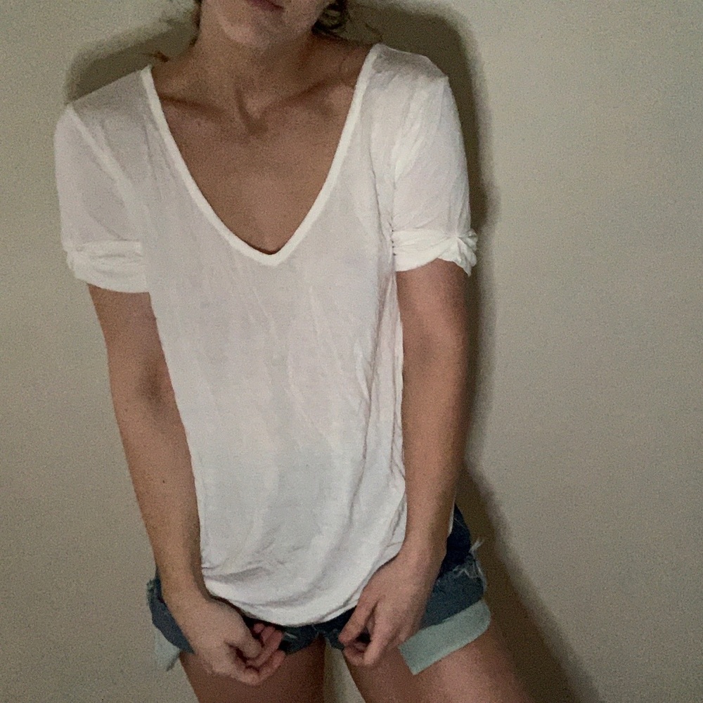 White vneck with rolled sleeves